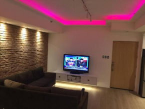 Cozy60sqm 1BR balcony/prking/Wifi/Ntflix near Mall